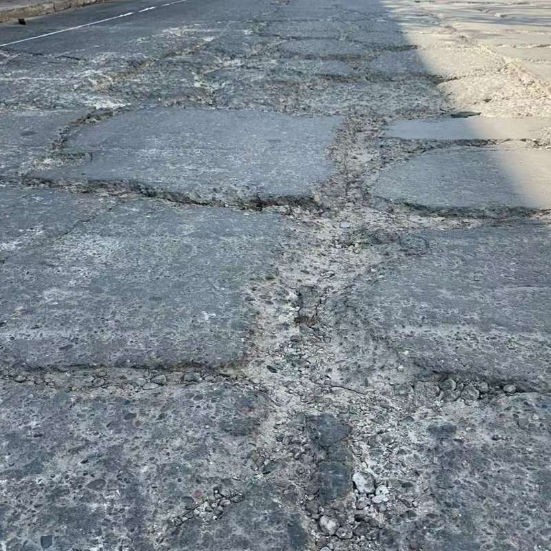 陇川路面起砂露石子修补料